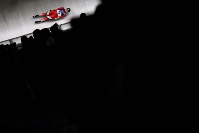 Switzerland's Natalie Maag competes in the luge women's singles run 2 at Cortina Sliding Centre during the Milano Cortina 2026 Winter Olympic Games in Cortina d'Ampezzo on February 9, 2026. (Photo by Franck FIFE / AFP)