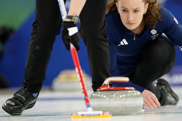 Britain's Jennifer Dodds competes in the curling mixed doubles round robin semi-final between Great Britain and Sweden during the Milano Cortina 2026 Winter Olympic Games at the Cortina Curling Olympic Stadium in Cortina d’Ampezzo on February 9, 2026. (Photo by Odd ANDERSEN / AFP)