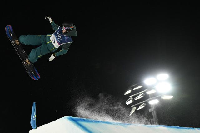 Australia's Tess Coady competes in the snowboard women's big air final run 1 during the Milano Cortina 2026 Winter Olympic Games at Livigno Snow Park, in Livigno (Valtellina), on February 9, 2026. (Photo by Jeff PACHOUD / AFP)