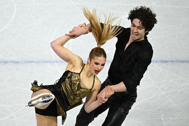 Spain's Sofia Val and Spain's Asaf Kazimov compete in the figure skating team event ice dance-rhythm dance during the Milano Cortina 2026 Winter Olympic Games at Milano Ice Skating Arena in Milan on February 9, 2026. (Photo by Gabriel BOUYS / AFP)