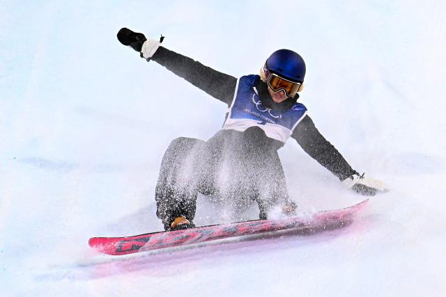 Austria's Anna Gasser competes in the snowboard women's big air final run 1 during the Milano Cortina 2026 Winter Olympic Games at Livigno Snow Park, in Livigno (Valtellina), on February 9, 2026. (Photo by Kirill KUDRYAVTSEV / AFP)