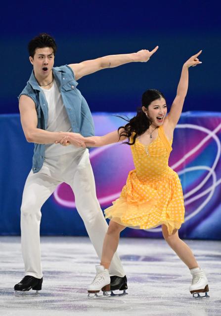 China's Liu Xinyu and China's Wang Shiyue compete in the figure skating team event ice dance-rhythm dance during the Milano Cortina 2026 Winter Olympic Games at Milano Ice Skating Arena in Milan on February 9, 2026. (Photo by Piero CRUCIATTI / AFP)