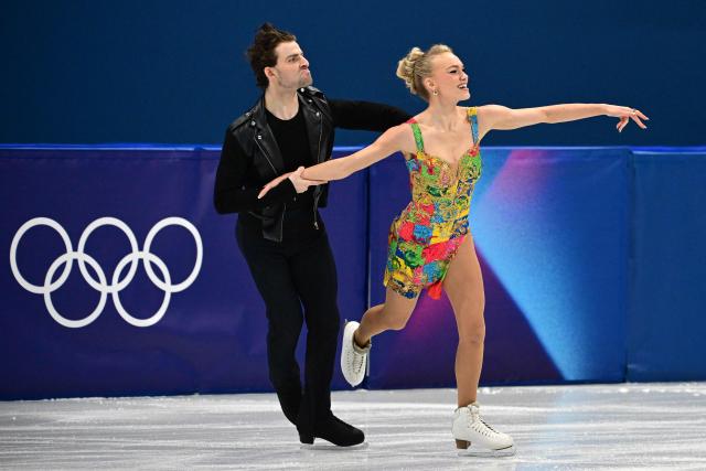 Britain's Phebe Bekker and Britain's James Hernandez compete in the figure skating team event ice dance-rhythm dance during the Milano Cortina 2026 Winter Olympic Games at Milano Ice Skating Arena in Milan on February 9, 2026. (Photo by Piero CRUCIATTI / AFP)