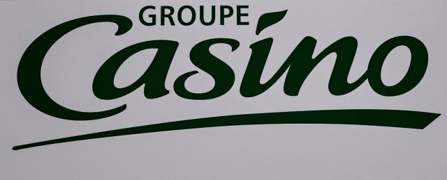 (FILES) This photograph taken on June 11, 2024 shows the logo of French supermarket and retail group Casino displayed during the General Assembly for Casino in Paris. The Casino Group (Monoprix, Franprix, etc.), which was fined Ђ40 million on January 29, including a Ђ20 million suspended fine, in the corruption trial involving its former CEO Jean-Charles Naouri, announced on February 9, 2026 that it would not be appealing the criminal aspect of the case. (Photo by STEPHANE DE SAKUTIN / AFP)