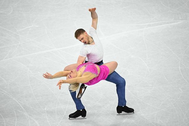 Czech Republic's Natalie Taschlerova and Czech Republic's Filip Taschler compete in the figure skating team event ice dance-rhythm dance during the Milano Cortina 2026 Winter Olympic Games at Milano Ice Skating Arena in Milan on February 9, 2026. (Photo by Gabriel BOUYS / AFP)