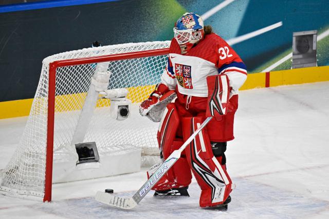 Czech Republic's #32 Julie Pejsova reacts after the 2-0 goal during the women's preliminary round Group A Ice Hockey match between Canada and Czech Republic at the Milano Rho Ice Hockey Arena at the Milano Cortina 2026 Winter Olympic Games in Milan, on February 9, 2026. (Photo by Alexander NEMENOV / AFP)