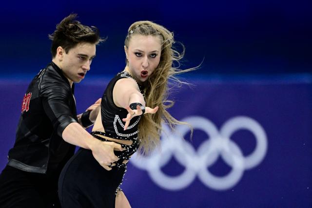 Czech Republic's Katerina Mrazkova and Czech Republic's Daniel Mrazek compete in the figure skating team event ice dance-rhythm dance during the Milano Cortina 2026 Winter Olympic Games at Milano Ice Skating Arena in Milan on February 9, 2026. (Photo by JULIEN DE ROSA / AFP)