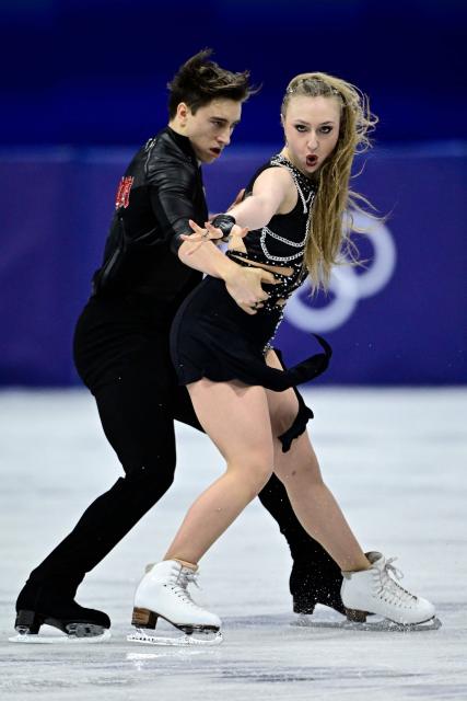 Czech Republic's Katerina Mrazkova and Czech Republic's Daniel Mrazek compete in the figure skating team event ice dance-rhythm dance during the Milano Cortina 2026 Winter Olympic Games at Milano Ice Skating Arena in Milan on February 9, 2026. (Photo by JULIEN DE ROSA / AFP)