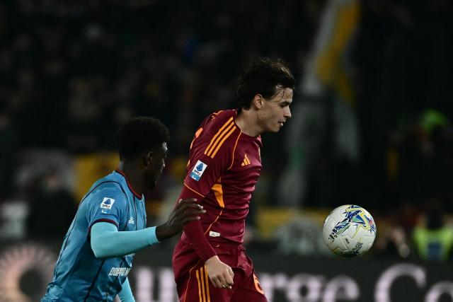 Roma's Italian midfielder #61 Niccolo Pisilli (R) fights for the ball with Cagliari's French defender #08 Michel Adopo during the Italian Serie A football match between AS Roma and Cagliari at the Olympic Stadium in Rome on Febuary 9, 2026. (Photo by Filippo MONTEFORTE / AFP)