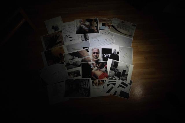 This photograph taken in Le-Perreux-sur-Marne, outside Paris on February 9, 2026 shows undated pictures provided by the US Department of Justice on January 30, 2026 as part of the Jeffrey Epstein files. US authorities on January 30, 2026, released the latest cache of files related to the investigation into the late conviceted sex offender Jeffrey Epstein. The files contained references to numerous high-profile figures. (Photo by Martin BUREAU / AFP)