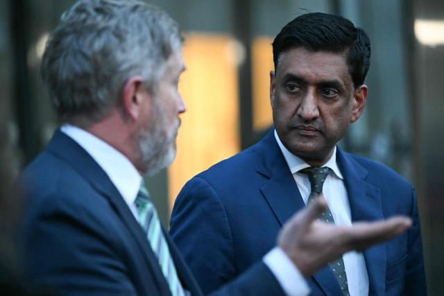 US Representatives Thomas Massie (L), Republican from Kentucky, and Ro Khanna, Democrat from California, speak to journalists outside the Department of Justice in Washington, DC, on February 9, 2026. Members of Congress will be allowed to review unredacted Jeffrey Epstein files on Department of Justice computers starting on February 9. (Photo by ANDREW CABALLERO-REYNOLDS / AFP)
