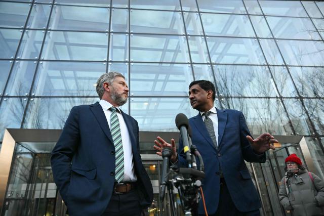 US Representatives Thomas Massie (L), Republican from Kentucky, and Ro Khanna, Democrat from California, speak outside the Department of Justice in Washington, DC, on February 9, 2026. Members of Congress will be allowed to review unredacted Jeffrey Epstein files on Department of Justice computers starting on February 9. (Photo by ANDREW CABALLERO-REYNOLDS / AFP)