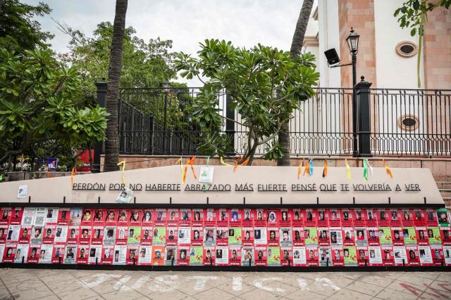 A memorial for victims of enforced disappearance is seen in downtown Culiacan, Sinaloa state, Mexico, on February 9, 2026. Three of the 10 employees of a Canadian mining company who were kidnapped two weeks ago in Mexico's violence-plagued Sinaloa state have been found dead, Mexico's Mining Chamber said on February 9. (Photo by Jesus Verdugo / AFP)