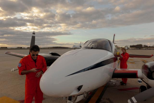 The crew of the Humanitarian Pilot Initiative (HPI) flight gets ready to the takeoff in Las Palmas on January 23, 2026. The Swiss NGO, with 10 years of experience in central Mediterranean, is on its third mission on the Atlantic route, helping to spot distressed migrants boats and support rescues. Migrants leaving west Africa and traveling up the Atlantic are usually trying to reach Europe by first landing in the Canary Islands off northwestern Africa.
The Spanish archipelago is the jumping off point for their continued journey onward to the European continent.
More than 3,000 migrants died in 2025 while attempting to reach Spain clandestinely, according to the Spanish NGO Caminando Fronteras.
While HPI has operated for 10 years in the central Mediterranean, it is a relative newcomer to the Atlantic.
In the Mediterranean, it has already helped spot more than 1,000 boats, alerting international NGO rescue ships which can then go and help. (Photo by MICHELE CATTANI / AFP)