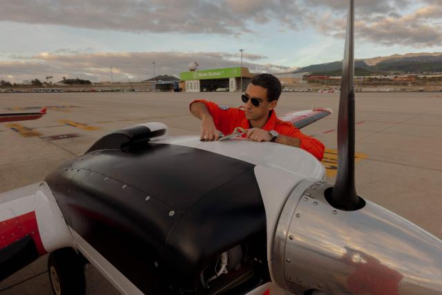 The pilot of the Humanitarian Pilot Initiative (HPI) checks the oil of one of the propellers before the takeoff in Las Palmas on January 23, 2026. The Swiss NGO, with 10 years of experience in central Mediterranean, is on its third mission on the Atlantic route, helping to spot distressed migrants boats and support rescues. Migrants leaving west Africa and traveling up the Atlantic are usually trying to reach Europe by first landing in the Canary Islands off northwestern Africa.
The Spanish archipelago is the jumping off point for their continued journey onward to the European continent.
More than 3,000 migrants died in 2025 while attempting to reach Spain clandestinely, according to the Spanish NGO Caminando Fronteras.
While HPI has operated for 10 years in the central Mediterranean, it is a relative newcomer to the Atlantic.
In the Mediterranean, it has already helped spot more than 1,000 boats, alerting international NGO rescue ships which can then go and help. (Photo by MICHELE CATTANI / AFP)
