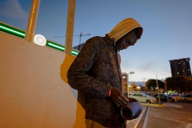 A Senegalese man connects a speaker to his phone while he walks through Las Palmas, Gran Canaria, on January 19, 2026, one week after arriving on the island via the Atlantic route from Gambia. Migrants leaving west Africa and traveling up the Atlantic are usually trying to reach Europe by first landing in the Canary Islands off northwestern Africa.
The Spanish archipelago is the jumping off point for their continued journey onward to the European continent.
More than 3,000 migrants died in 2025 while attempting to reach Spain clandestinely, according to the Spanish NGO Caminando Fronteras.
While HPI has operated for 10 years in the central Mediterranean, it is a relative newcomer to the Atlantic.
In the Mediterranean, it has already helped spot more than 1,000 boats, alerting international NGO rescue ships which can then go and help. (Photo by MICHELE CATTANI / AFP)
