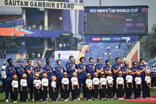 Namibia team players stand for the national anthem before the start of the 2026 ICC Men's T20 Cricket World Cup group stage match between Netherlands and Namibia at the Arun Jaitley Stadium in New Delhi on February 10, 2026. (Photo by Arun SANKAR / AFP)