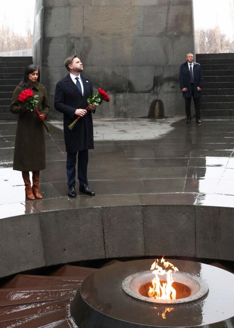 US Vice President JD Vance, second lady Usha Vance pay their respects at the eternal flame during a visit to the Tsitsernakaberd Armenian Genocide Memorial, in Yerevan, Armenia, on February 10, 2026. (Photo by Kevin Lamarque / POOL / AFP)