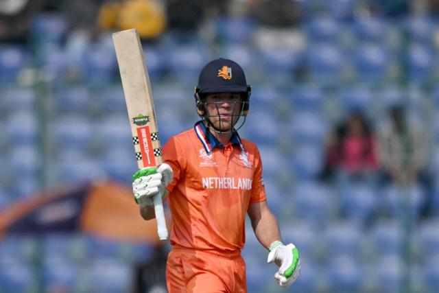 Netherlands' Bas de Leede celebrates after scoring a half-century (50 runs) during the 2026 ICC Men's T20 Cricket World Cup group stage match between Netherlands and Namibia at the Arun Jaitley Stadium in New Delhi on February 10, 2026. (Photo by Arun SANKAR / AFP)