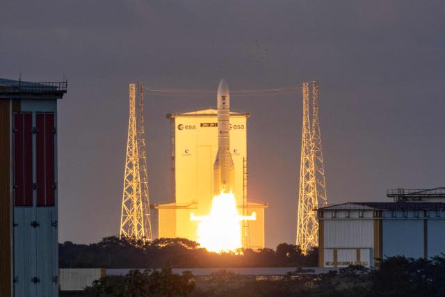 (FILES) This photograph shows the European Space Agency (ESA) Ariane 6 rocket carrying the Sentinel 1-D earth observation satellite by European Space Agency (ESA) blasts off at the Guiana Space Centre in Kourou, on the French overseas department of Guiana, on November 4, 2025. The European Space Agency (ESA) Ariane 6 rocket launch, which is scheduled for February 12, 2026, will accelerate the deployment of the Amazon Leo constellation from the group founded by American billionaire Jeff Bezos and designed to compete with Elon Musk's Starlink. (Photo by Ronan LIETAR / AFP)