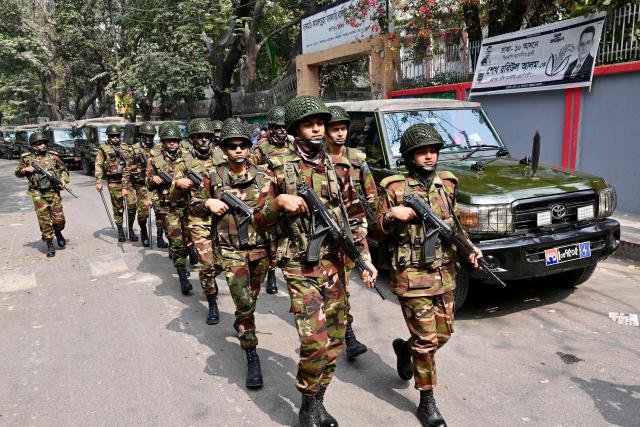 Bangladesh Army personnel patrol outside a polling station in Dhaka on February 10, 2025 ahead of the country's general election on February 12. (Photo by MUNIR UZ ZAMAN / AFP)