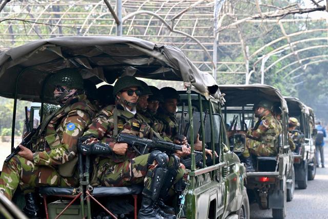 Bangladesh Army personnel patrol in Dhaka on February 10, 2025 ahead of the country's general election on February 12. (Photo by MUNIR UZ ZAMAN / AFP)