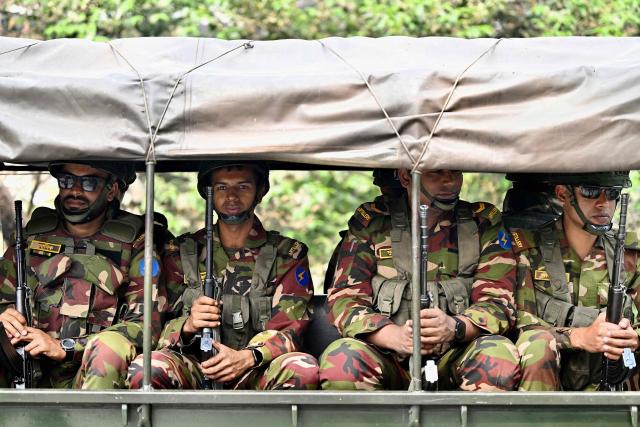 Bangladesh Army personnel patrol in Dhaka on February 10, 2025 ahead of the country's general election on February 12. (Photo by MUNIR UZ ZAMAN / AFP)