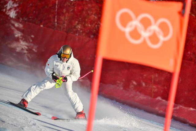Italy's Nadia Delago inspects the course prior to the downhill run of the women's team combined event during the Milano Cortina 2026 Winter Olympic Games at the Tofane Alpine Skiing Centre in Cortina d’Ampezzo on February 10, 2026. (Photo by Marco BERTORELLO / AFP)