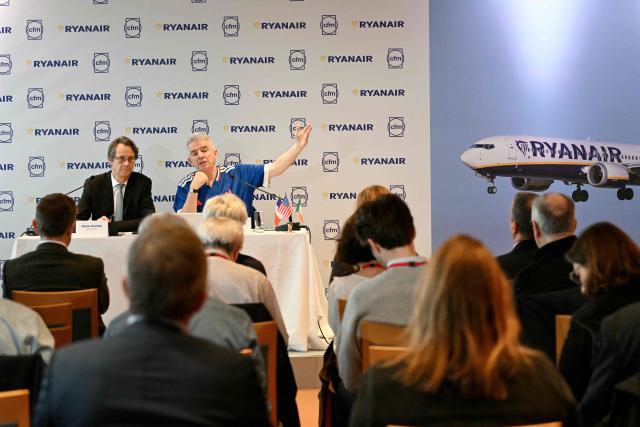 Chief Executive Officer of French aerospace supplier Safran Olivier Andries (L) and Chief executive of lowcost airline Ryanair, Michael O'Leary pose during a press conference to present a new partnership in Paris on February 10, 2026. (Photo by Bertrand GUAY / AFP)