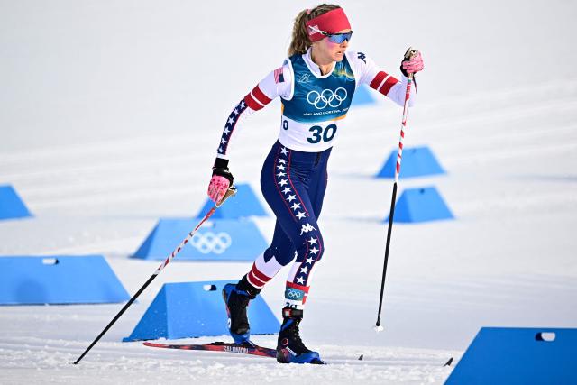 USA's Jessie Diggins competes during the women's cross country sprint classic qualification event of the Milano Cortina 2026 Winter Olympic Games at Tesero Cross-Country Skiing Stadium in Lago di Tesero (Val di Fiemme), on February 10, 2026. (Photo by Tobias SCHWARZ / AFP)