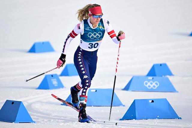 USA's Jessie Diggins competes during the women's cross country sprint classic qualification event of the Milano Cortina 2026 Winter Olympic Games at Tesero Cross-Country Skiing Stadium in Lago di Tesero (Val di Fiemme), on February 10, 2026. (Photo by Tobias SCHWARZ / AFP)
