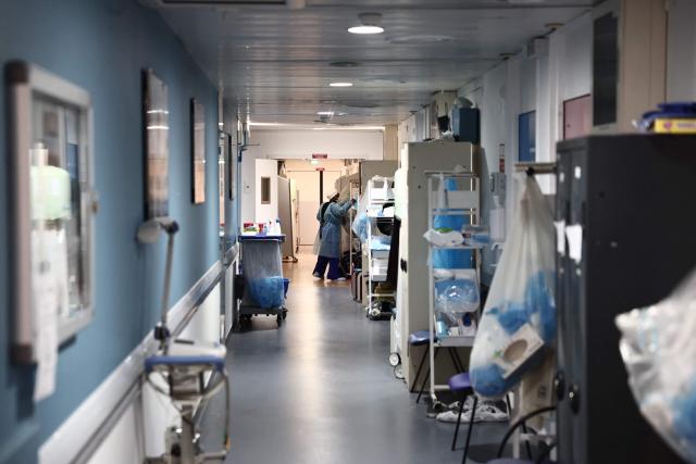 A nurse walks through the corridors of the sterile ward at the Timone pediatric hospital in Marseille on January 23, 2026. The “Sourire а la vie” association, which operates within the hospital, offers children with cancer to engage in physical activity during their often lengthy hospital stays. (Photo by Thibaud MORITZ / AFP)