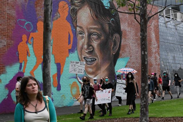Pro-Palestinian protesters gather in front of a police station in Surry Hills in Sydney on February 10, 2026, to condemn the police crackdown on protesters demonstrating against the Israeli President Isaac Herzog's visit to Australia. (Photo by Saeed KHAN / AFP)