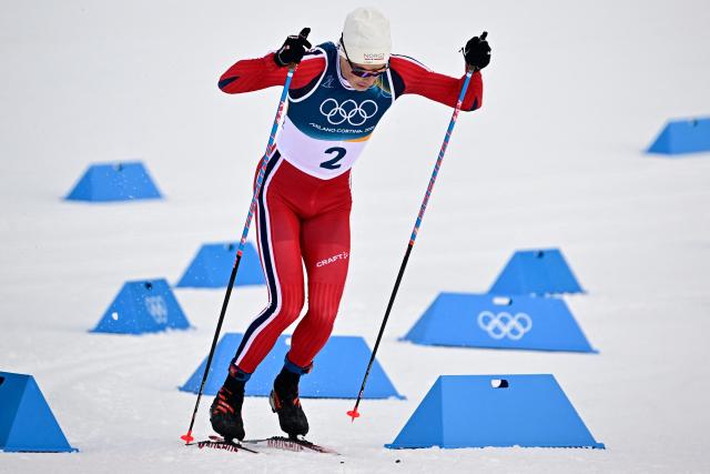 Norway's Harald Oestberg Amundsen competes during the men's cross country sprint classic qualification event of the Milano Cortina 2026 Winter Olympic Games at Tesero Cross-Country Skiing Stadium in Lago di Tesero (Val di Fiemme), on February 10, 2026. (Photo by Tobias SCHWARZ / AFP)