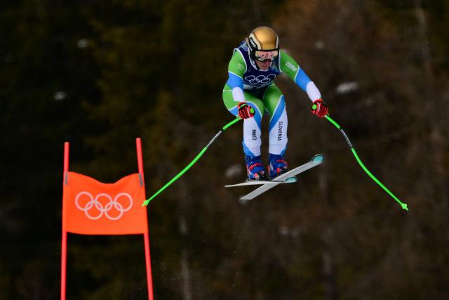 Slovenia's Ilka Stuhec competes in the downhill run of the women's team combined event during the Milano Cortina 2026 Winter Olympic Games at the Tofane Alpine Skiing Centre in Cortina d’Ampezzo on February 10, 2026. (Photo by Stefano RELLANDINI / AFP)