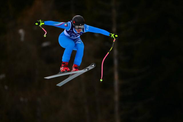 Italy's Nicol Delago competes in the downhill run of the women's team combined event during the Milano Cortina 2026 Winter Olympic Games at the Tofane Alpine Skiing Centre in Cortina d’Ampezzo on February 10, 2026. (Photo by Stefano RELLANDINI / AFP)