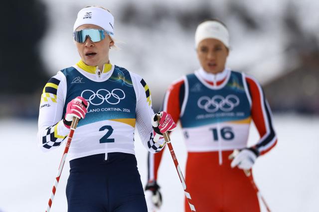 Sweden's Jonna Sundling reacts after competing in heat 1 of the women's cross country sprint classic quarterfinals event of the Milano Cortina 2026 Winter Olympic Games at Tesero Cross-Country Skiing Stadium in Lago di Tesero (Val di Fiemme), on February 10, 2026. (Photo by Anne-Christine POUJOULAT / AFP)