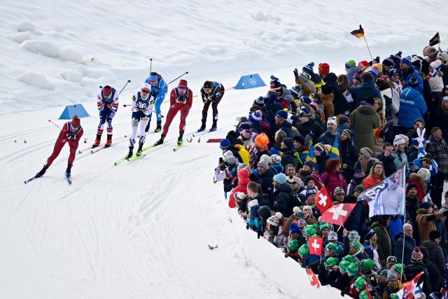 (From L) Switzerland's Nadine Faehndrich, USA's Julia Kern, Sweden's Linn Svahn, Italy's Caterina Ganz, Switzerland's Anja Weber and Germany's Sofie Krehl compete in heat 2 of the women's cross country sprint classic quarterfinals event of the Milano Cortina 2026 Winter Olympic Games at Tesero Cross-Country Skiing Stadium in Lago di Tesero (Val di Fiemme), on February 10, 2026. (Photo by Tobias SCHWARZ / AFP)