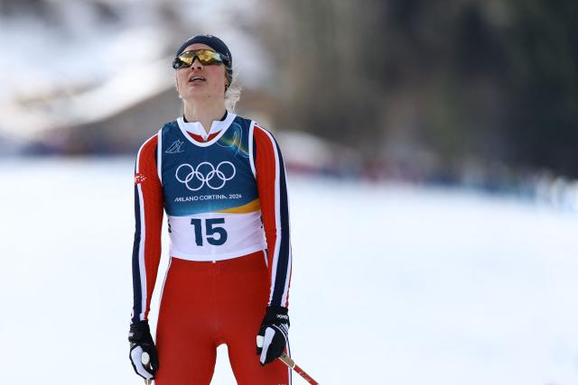 Norway's Julie Bjervig Drivenes reacts after competing in heat 3 of the women's cross country sprint classic quarterfinals event of the Milano Cortina 2026 Winter Olympic Games at Tesero Cross-Country Skiing Stadium in Lago di Tesero (Val di Fiemme), on February 10, 2026. (Photo by Anne-Christine POUJOULAT / AFP)
