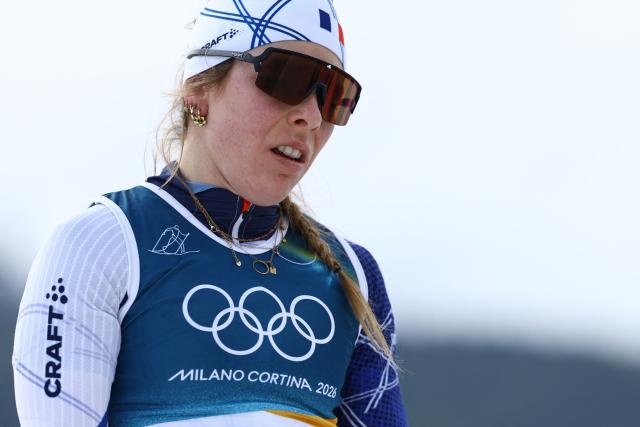 France's Melissa Gal reacts after competing in heat 3 of the women's cross country sprint classic quarterfinals event of the Milano Cortina 2026 Winter Olympic Games at Tesero Cross-Country Skiing Stadium in Lago di Tesero (Val di Fiemme), on February 10, 2026. (Photo by Anne-Christine POUJOULAT / AFP)