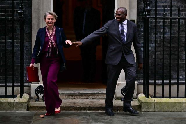 Britain's Foreign Secretary Yvette Cooper (L) and Britain's Justice Secretary and deputy Prime Minister David Lammy leave following a cabinet meeting at 10 Downing Street in central London on February 10, 2026. Britain's Prime Minister Keir Starmer insisted he would not "walk away" on February 9 after a prominent ally demanded the prime minister quit for embroiling the British government in the Jeffrey Epstein scandal. (Photo by Ben STANSALL / AFP)