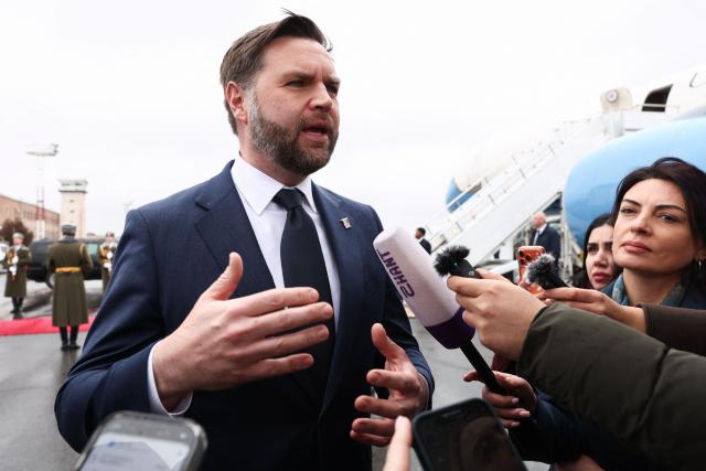 US Vice President JD Vance speaks to the media before boarding Air Force Two upon departure for Azerbaijan, at Zvartnots International Airport in Yerevan on February 10, 2026. (Photo by Kevin Lamarque / POOL / AFP)
