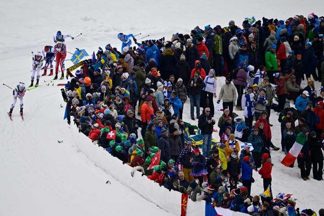 Sweden's Jonna Sundling (L) leads in heat 1 of the women's cross country sprint classic semifinals event of the Milano Cortina 2026 Winter Olympic Games at Tesero Cross-Country Skiing Stadium in Lago di Tesero (Val di Fiemme), on February 10, 2026. (Photo by Tobias SCHWARZ / AFP)