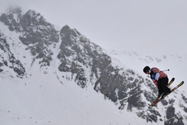 Norway's Birk Ruud competes in the freestyle skiing men's freeski slopestyle final run 1 during the Milano Cortina 2026 Winter Olympic Games at Livigno Snow Park, in Livigno (Valtellina), on February 10, 2026. (Photo by Jeff PACHOUD / AFP)