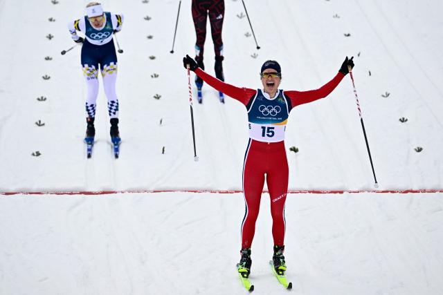Norway's Julie Bjervig Drivenes crosses the finish line in heat 2 of the women's cross country sprint classic semifinals event of the Milano Cortina 2026 Winter Olympic Games at Tesero Cross-Country Skiing Stadium in Lago di Tesero (Val di Fiemme), on February 10, 2026. (Photo by Tobias SCHWARZ / AFP)