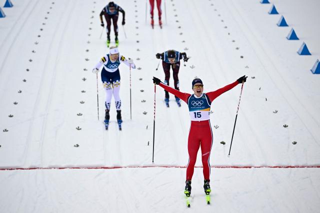 Norway's Julie Bjervig Drivenes crosses the finish line in heat 2 of the women's cross country sprint classic semifinals event of the Milano Cortina 2026 Winter Olympic Games at Tesero Cross-Country Skiing Stadium in Lago di Tesero (Val di Fiemme), on February 10, 2026. (Photo by Tobias SCHWARZ / AFP)