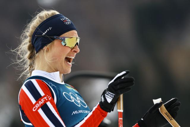 Norway's Julie Bjervig Drivenes reacts after she crossed the finish line in heat 2 of the women's cross country sprint classic semifinals event of the Milano Cortina 2026 Winter Olympic Games at Tesero Cross-Country Skiing Stadium in Lago di Tesero (Val di Fiemme), on February 10, 2026. (Photo by Anne-Christine POUJOULAT / AFP)
