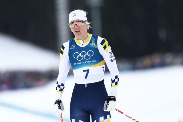 Sweden's Maja Dahlqvist reacts after she crossed the finish line in heat 2 of the women's cross country sprint classic semifinals event of the Milano Cortina 2026 Winter Olympic Games at Tesero Cross-Country Skiing Stadium in Lago di Tesero (Val di Fiemme), on February 10, 2026. (Photo by Anne-Christine POUJOULAT / AFP)