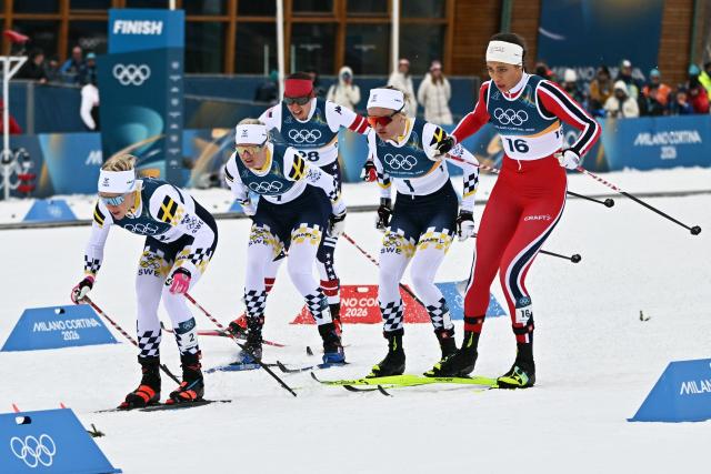 (From L) Sweden's Jonna Sundling, Sweden's Maja Dahlqvist, USA's Julia Kern, Sweden's Linn Svahn and Norway's Kristine Stavaas Skistad take the start during the women's cross country sprint classic final event of the Milano Cortina 2026 Winter Olympic Games at Tesero Cross-Country Skiing Stadium in Lago di Tesero (Val di Fiemme), on February 10, 2026. (Photo by Javier SORIANO / AFP)
