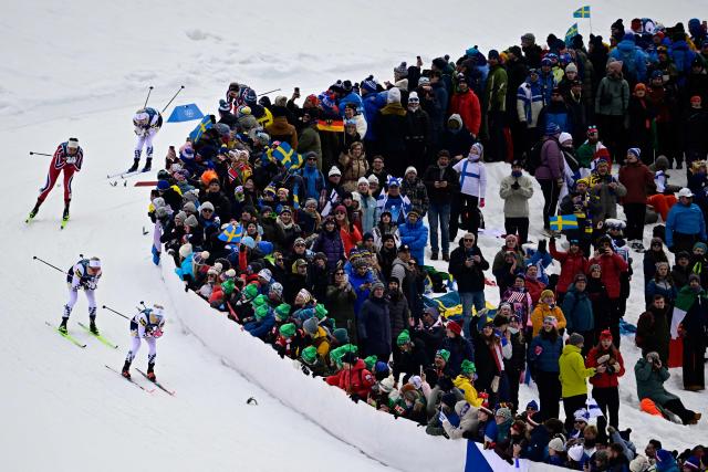 Sweden's Jonna Sundling (L) followed by Sweden's Linn Svahn competes during the women's cross country sprint classic final event of the Milano Cortina 2026 Winter Olympic Games at Tesero Cross-Country Skiing Stadium in Lago di Tesero (Val di Fiemme), on February 10, 2026. (Photo by Tobias SCHWARZ / AFP)
